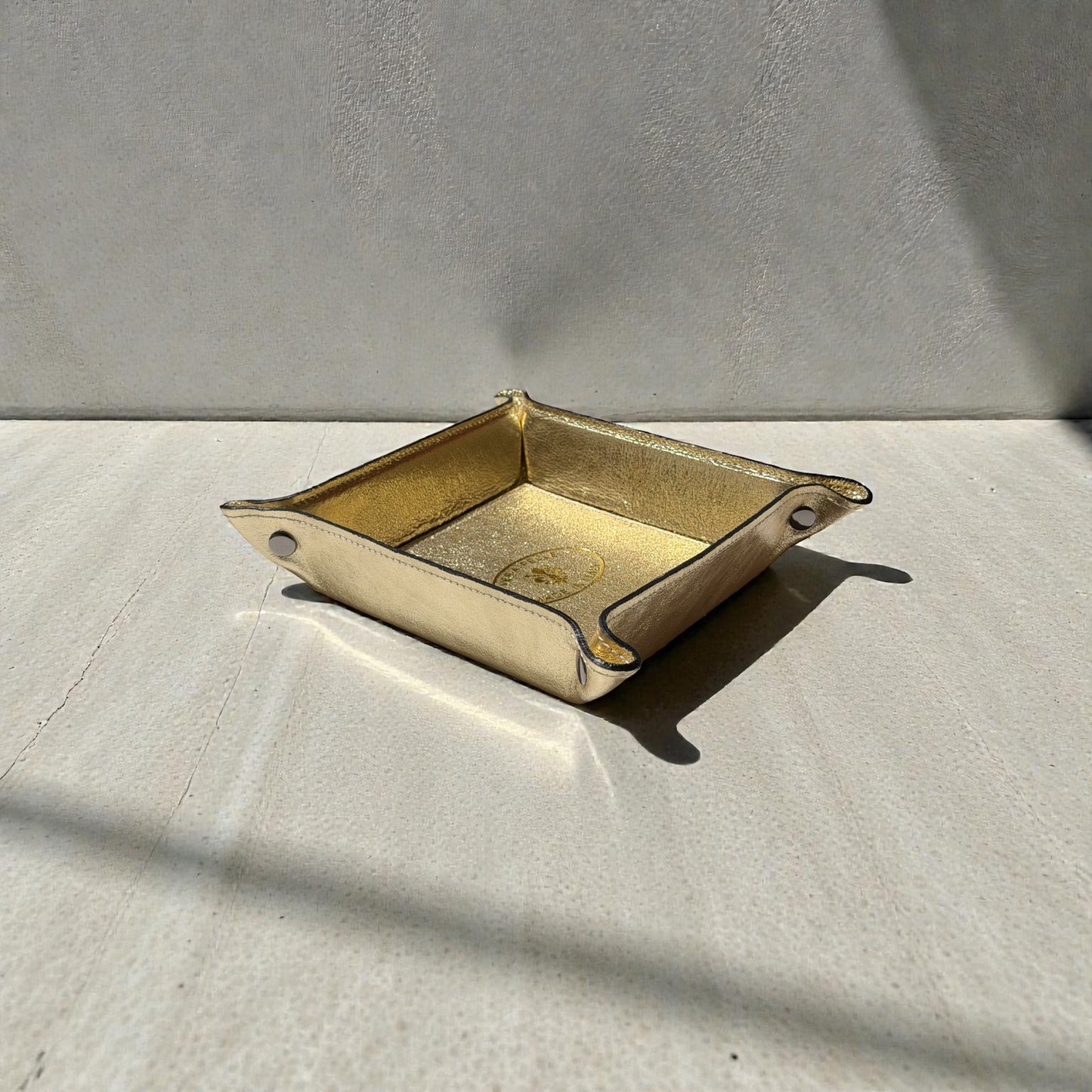 Vaciabolsillos de cuero