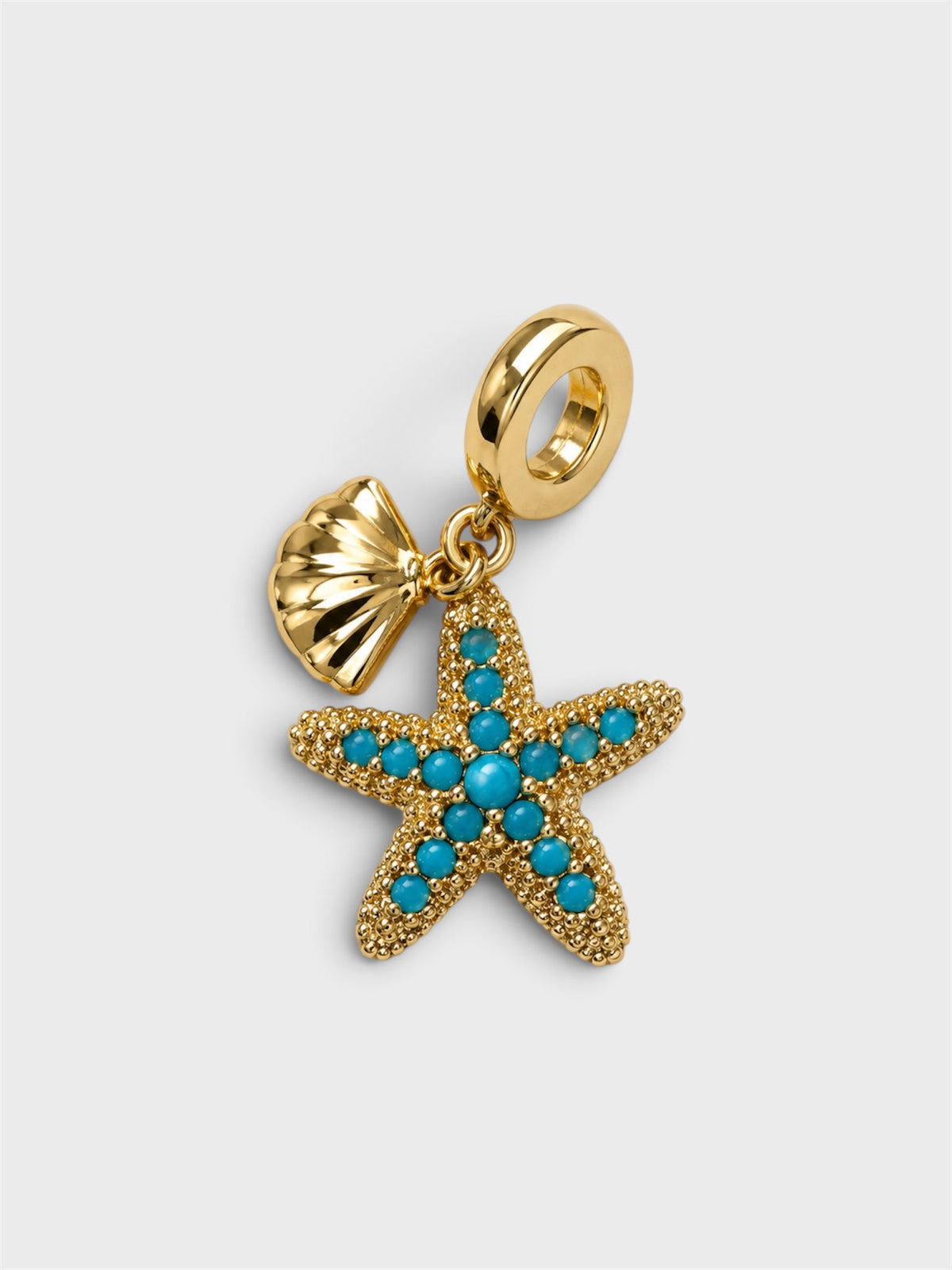 Charm estrella azul con concha
